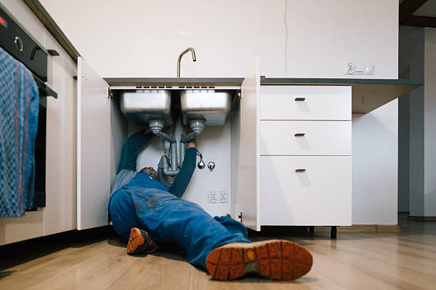 Professional Emergency Plumber technician working in Springtown, PA